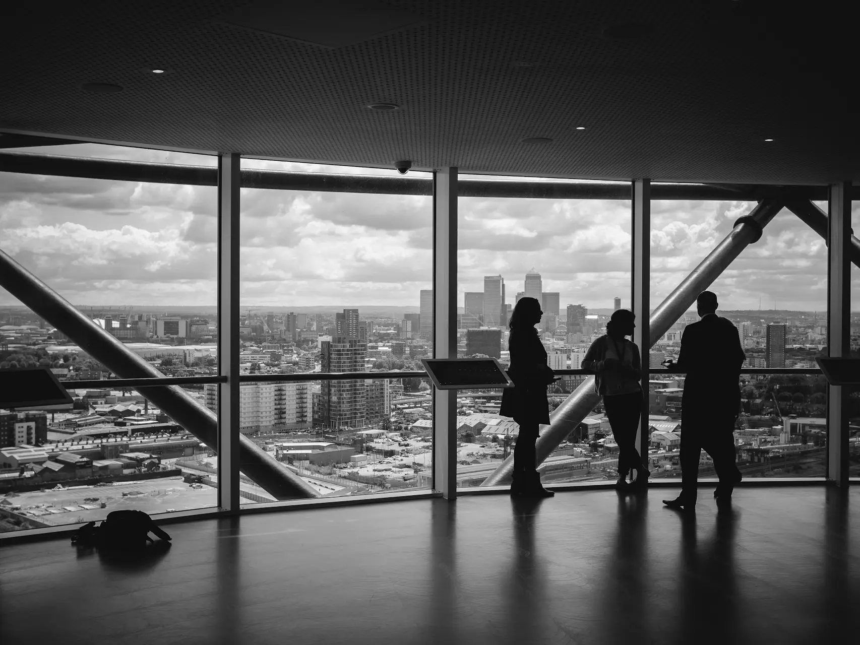 people standing inside city building